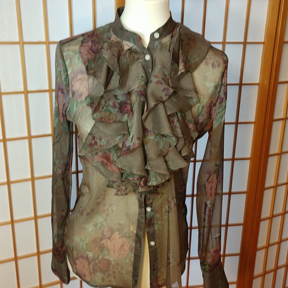 Sheer rose pattern blouse with front ruffles.